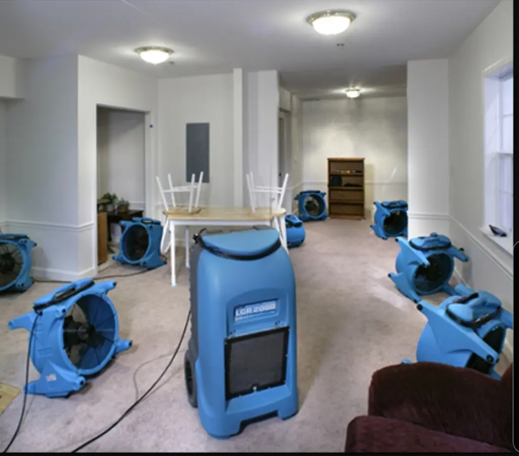 Air movers and dehumidifier setup for Water Damage Restoration in Franklin
